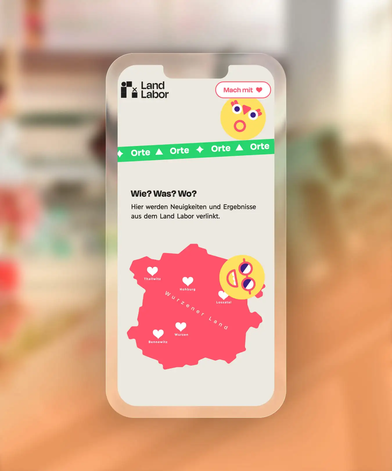 Smartphone-Bildschirm mit der Land Labor Website